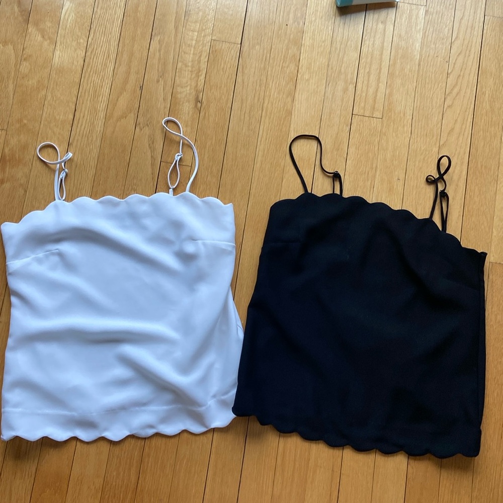 Two Banana Republic scallop edge camisoles. One black one white